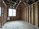Bedroom framing shows walls and ceilings being built with a window to allow natural light, construction phase at 1509 Chatham Rdg Ct, Westfield, IN 46074