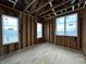 Bedroom stud framing allows natural light, with walls and ceiling being built during construction phase at 1509 Chatham Rdg Ct, Westfield, IN 46074