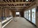 Future living room with folding doors allowing a lot of natural light at 1509 Chatham Rdg Ct, Westfield, IN 46074