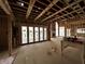Under-construction living room with expansive folding doors leading to the outside at 1509 Chatham Rdg Ct, Westfield, IN 46074