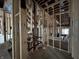 Room under construction with wood framing and exposed pipes at 1509 Chatham Rdg Ct, Westfield, IN 46074
