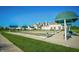 Bocce ball court with umbrellas and seating at 16204 Oakford Trl, Fishers, IN 46037
