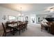 Well lit dining room, open to the office and living room at 16204 Oakford Trl, Fishers, IN 46037