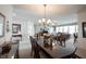 Well lit dining room, open to the office and living room at 16204 Oakford Trl, Fishers, IN 46037