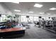Bright and spacious gym with an array of weight training equipment and cardio machines at 16204 Oakford Trl, Fishers, IN 46037