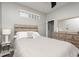 This bedroom features a stylish headboard, soft lighting, and elegant decor, providing a comforting ambiance at 1641 N Cornell Ave, Indianapolis, IN 46202