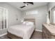 This bedroom features wood flooring and a neutral color scheme creating a peaceful and inviting retreat at 1641 N Cornell Ave, Indianapolis, IN 46202
