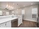 Bright kitchen featuring stainless steel appliances, recessed lighting, and ample counter space for food preparation at 1641 N Cornell Ave, Indianapolis, IN 46202