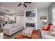 Contemporary living room with fireplace, comfortable seating, and an open floor plan at 1641 N Cornell Ave, Indianapolis, IN 46202