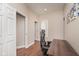 Bright home office features wood floors, neutral walls, and a functional desk setup at 1641 N Cornell Ave, Indianapolis, IN 46202