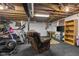 Basement space includes fitness equipment and a comfortable sitting area at 1840 W 100 N, Columbus, IN 47201