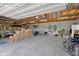 Large garage interior with storage and plenty of room for bicycles at 1840 W 100 N, Columbus, IN 47201
