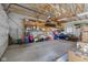 Spacious garage interior with wooden support beams and convenient storage shelves at 1840 W 100 N, Columbus, IN 47201