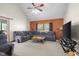 Inviting living room features a large sectional couch, textured wall, and ample natural light at 1840 W 100 N, Columbus, IN 47201
