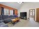 Spacious living room is perfect for entertaining with vaulted ceilings and open access to the hallway at 1840 W 100 N, Columbus, IN 47201