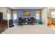Inviting home office with multiple desks, large windows, and built in storage at 1840 W 100 N, Columbus, IN 47201