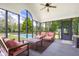 Relaxing screened-in patio with views of the pool and backyard at 1840 W 100 N, Columbus, IN 47201