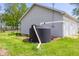 Rainwater tank near the garage that is used for water conservation and garden irrigation at 1840 W 100 N, Columbus, IN 47201