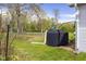 A large rainwater tank and piping located outside on the grounds of this property at 1840 W 100 N, Columbus, IN 47201
