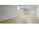 Spacious unfinished basement area with light wood flooring at 1953 N Alton Ave, Indianapolis, IN 46222