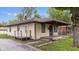 Charming single-story home with a covered front porch and neutral siding at 1953 N Alton Ave, Indianapolis, IN 46222