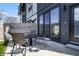 Back patio with outdoor seating and sliding glass doors at 2226 Central Ave, Indianapolis, IN 46205