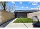 Backyard with a grassy area and wooden privacy fence at 2226 Central Ave, Indianapolis, IN 46205