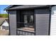 Exterior shot of a black balcony with railings and double doors leading inside the property at 2226 Central Ave, Indianapolis, IN 46205