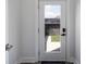 Bright entryway with glass paneled door and view of backyard at 2226 Central Ave, Indianapolis, IN 46205