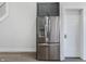 New stainless steel refrigerator and gray cabinetry at 2226 Central Ave, Indianapolis, IN 46205