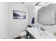 Charming half bathroom with modern fixtures, stylish accents, and shiplap details at 223 Haldale Dr, Carmel, IN 46032