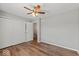 Bedroom featuring wood-look flooring, neutral paint, and closet at 223 Haldale Dr, Carmel, IN 46032