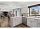 Modern kitchen featuring white cabinets, stainless steel appliances, and an open layout at 223 Haldale Dr, Carmel, IN 46032