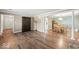 Open-concept living and dining area with hardwood floors and stylish decor at 223 Haldale Dr, Carmel, IN 46032