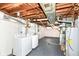 Unfinished basement with a laundry area and visible utilities at 251 S 12Th Ave, Beech Grove, IN 46107
