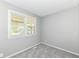 Bedroom featuring neutral walls, carpet flooring, and natural light at 251 S 12Th Ave, Beech Grove, IN 46107