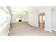 Bright living room with fireplace offers lots of space with neutral walls and flooring at 251 S 12Th Ave, Beech Grove, IN 46107