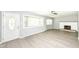 A well-lit living room featuring neutral walls and modern flooring at 251 S 12Th Ave, Beech Grove, IN 46107