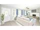 Bright living room with fireplace, white sofa, and ample natural light at 251 S 12Th Ave, Beech Grove, IN 46107