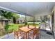 Outdoor patio featuring a dining table set and stainless steel gas grill at 251 S 12Th Ave, Beech Grove, IN 46107