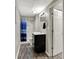 Basement bathroom includes a vanity, shower-tub, wood-look floors, and recessed lighting at 251 Yorktown Rd, Greenwood, IN 46142