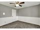 Bedroom features gray walls with white trim, carpet, and ceiling fan at 251 Yorktown Rd, Greenwood, IN 46142