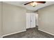 Bedroom featuring neutral walls, plush carpet, ceiling fan, and closet at 251 Yorktown Rd, Greenwood, IN 46142