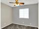 Bedroom featuring neutral walls, plush carpet, window, and ceiling fan at 251 Yorktown Rd, Greenwood, IN 46142