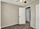 Bedroom has neutral walls, carpet, ceiling fan, and closet with additional doorway at 251 Yorktown Rd, Greenwood, IN 46142
