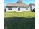 Spacious backyard with a green lawn and a patio area, perfect for outdoor activities at 2629 Calabash Dr, Indianapolis, IN 46217
