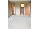 Bedroom featuring carpet, neutral walls, and two closet doors providing ample storage at 2629 Calabash Dr, Indianapolis, IN 46217