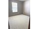 A bright bedroom with neutral walls and carpet at 2629 Calabash Dr, Indianapolis, IN 46217