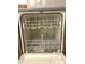 The image displays the interior of a white dishwasher, complete with racks for loading dishes at 2629 Calabash Dr, Indianapolis, IN 46217