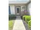 Close-up of front entrance with well-kept landscaping and a clean concrete walkway at 2629 Calabash Dr, Indianapolis, IN 46217